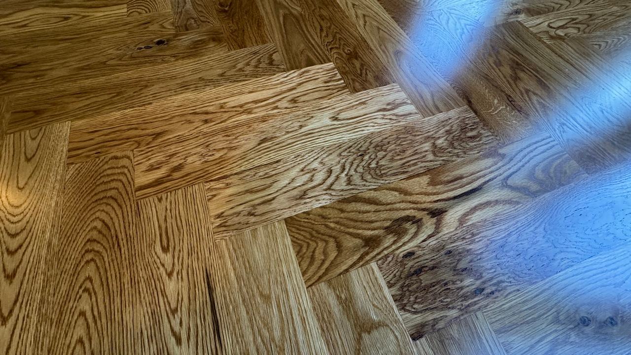 Herringbone Pattern! Transforming Homes with High-End — project photo by The Hardwood Guys