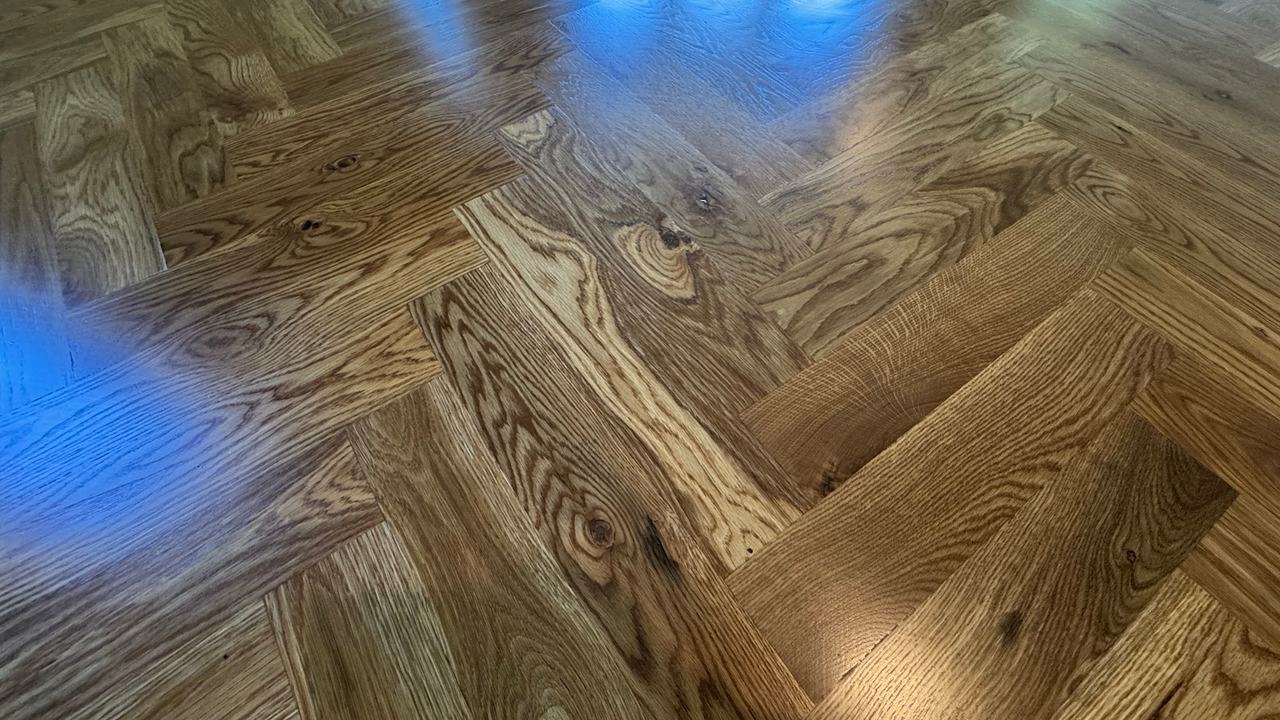 Herringbone Pattern! Transforming Homes with High-End — project photo by The Hardwood Guys