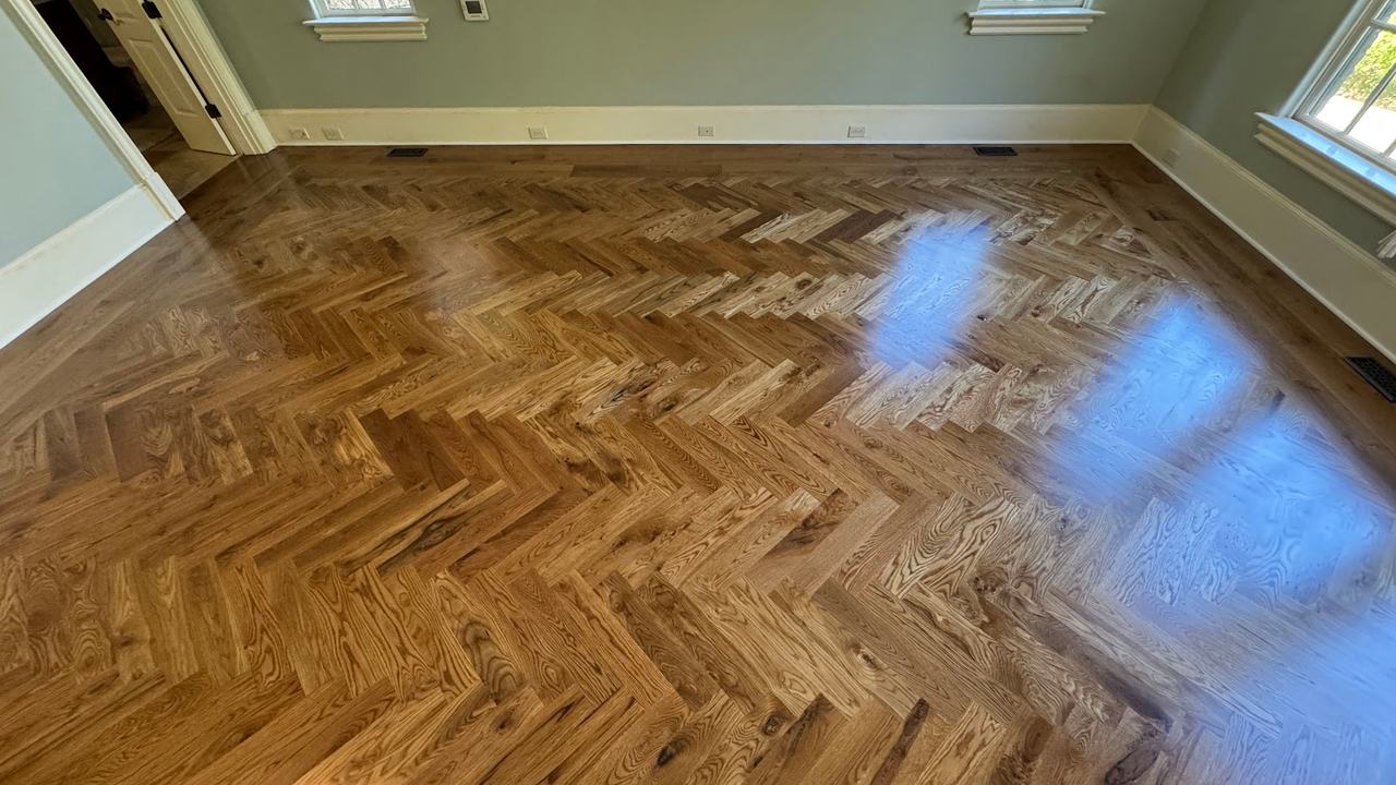 Herringbone Pattern! Transforming Homes with High-End — project photo by The Hardwood Guys