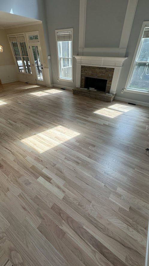 Refinished hardwood floor living room in a Kennesaw, GA home