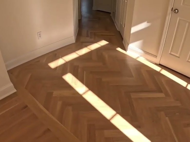Herringbone pattern in a white oak hallway floor, hardwood installation in Cumming, GA