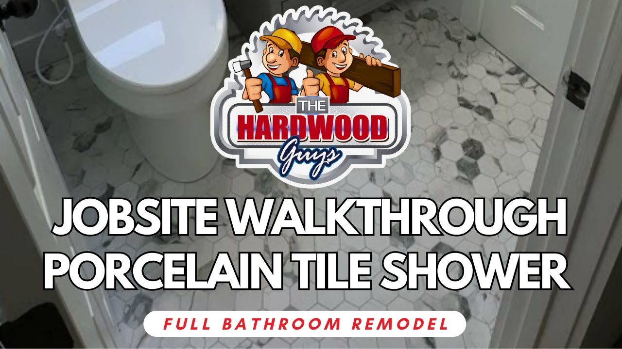 Bathroom remodel with Rialto Grand porcelain tile and a lighted shower niche, installed by The Hardwood Guys